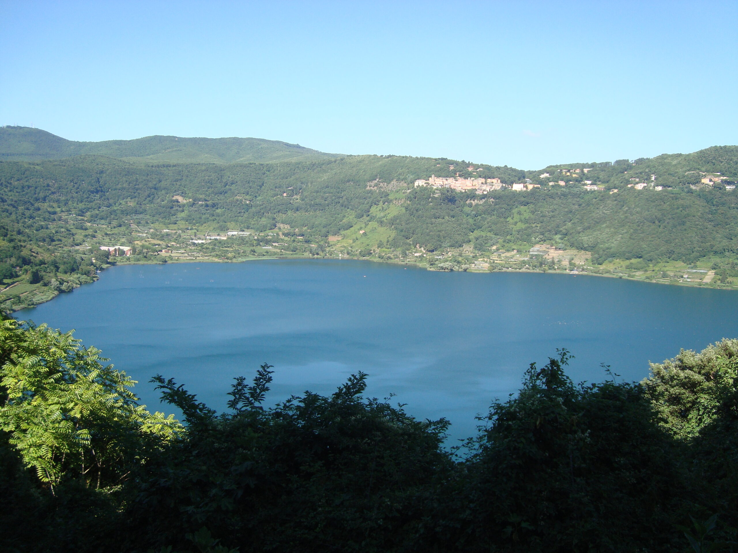 Lake Nemi surrounded by wooded hills in Italy